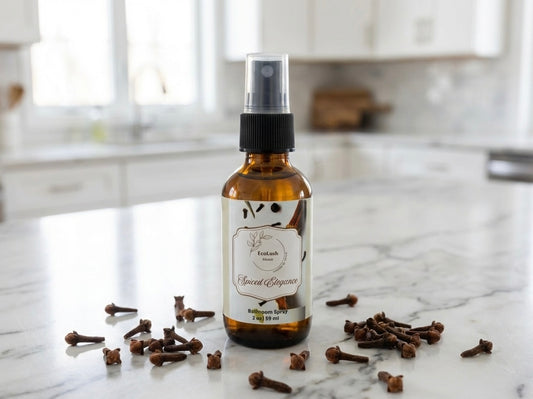 Eco-friendly air freshener in glass spray bottle made with non-toxic clove essential oils to remove odors.