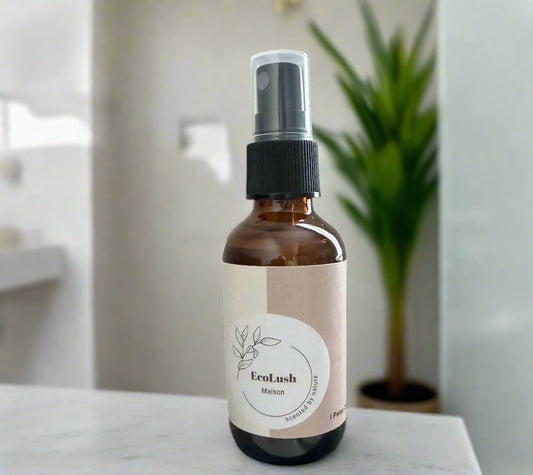 Eco-friendly air freshener in glass spray bottle made with non-toxic peppermint essential oils to remove odors.