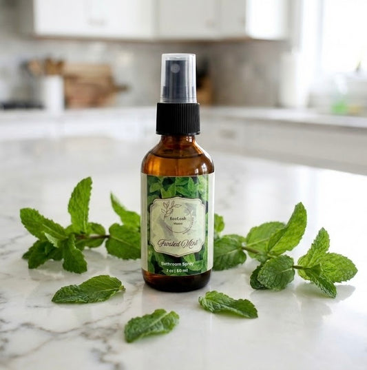 Eco-friendly air freshener in glass spray bottle made with non-toxic peppermint essential oils to remove odors.
